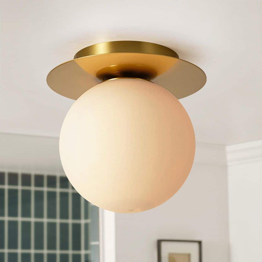 Taren 7.1 in. 1-Light Brass Modern Wall Sconce with Opal Glass Globe Shade price history on PriceWatchPro