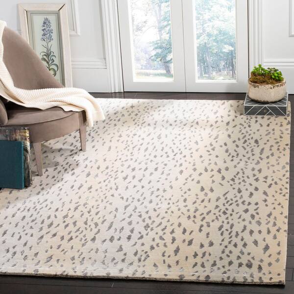 Tibetan 4 ft. x 6 ft. Silver Leopard Print Area Rug