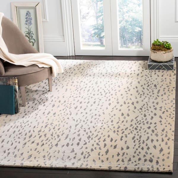 Tibetan 9 ft. x 12 ft. Silver Abstract Spotted Area Rug