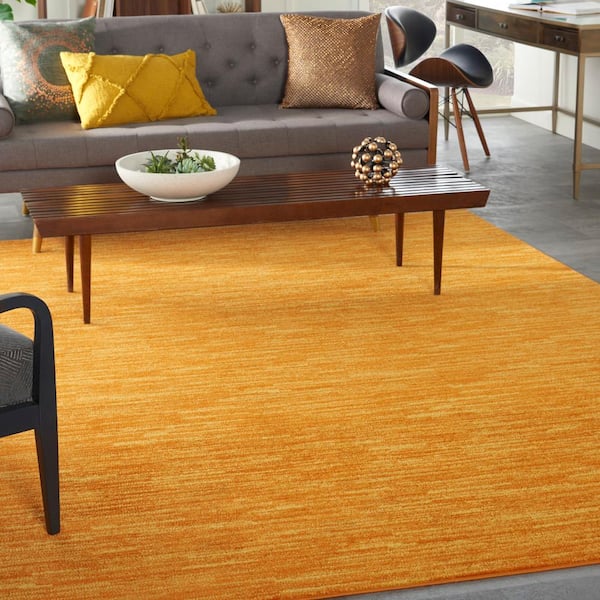 Essentials 6 ft. x 9 ft. Sunburst Solid Contemporary Indoor/Outdoor Patio Area Rug