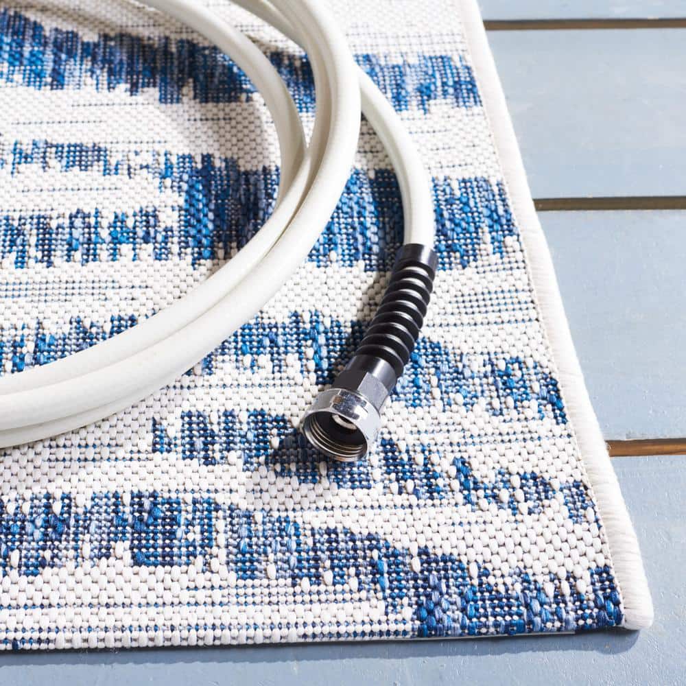 Ivory and Navy Square Stain-Resistant Cotton Outdoor Rug