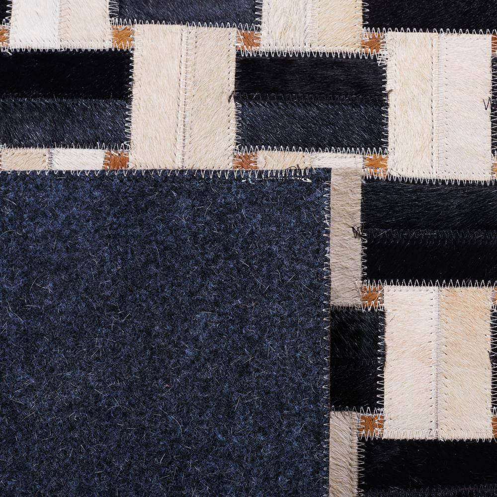 Black and Ivory Geometric Cowhide Area Rug