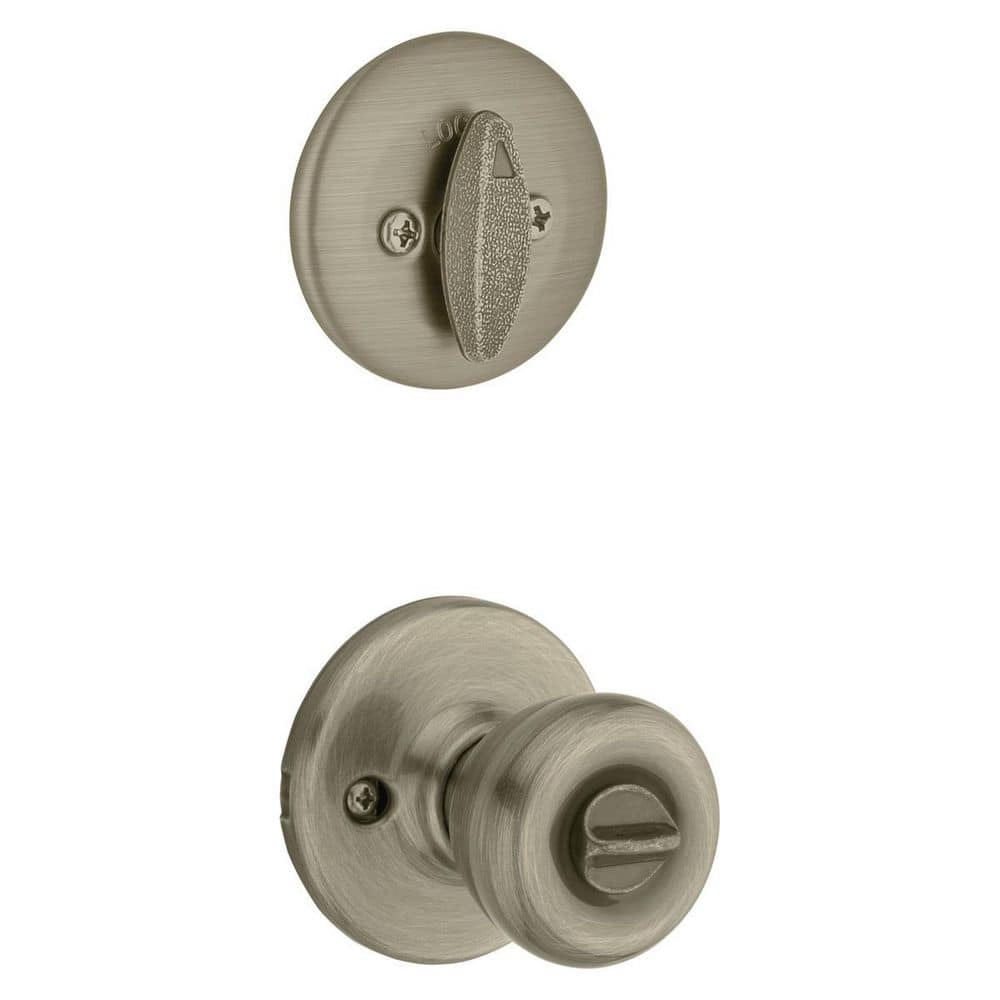 Condition photo showing As Is for tylo antique brass entry door knob and single cylinder deadbolt combo pack with microban antimicrobial technology (design differs from stock image)