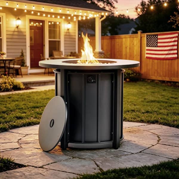 Black Round Steel Outdoor Fire Pit Table with Wood Grain Ceramic Tabletop and Glass Beads