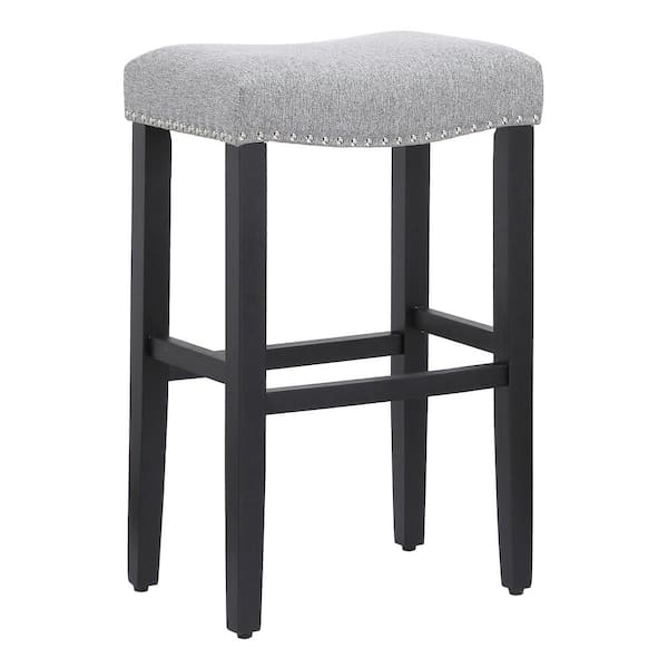 WESTINFURNITURE Jameson 29 in. Bar Height Black Wood Backless Nailhead Trim Barstool with Upholstered Gray Linen Saddle Seat Stool