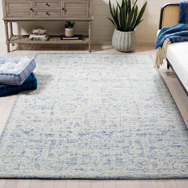 Roslyn 9 ft. x 12 ft. Blue/Ivory Distressed Ornate Area Rug