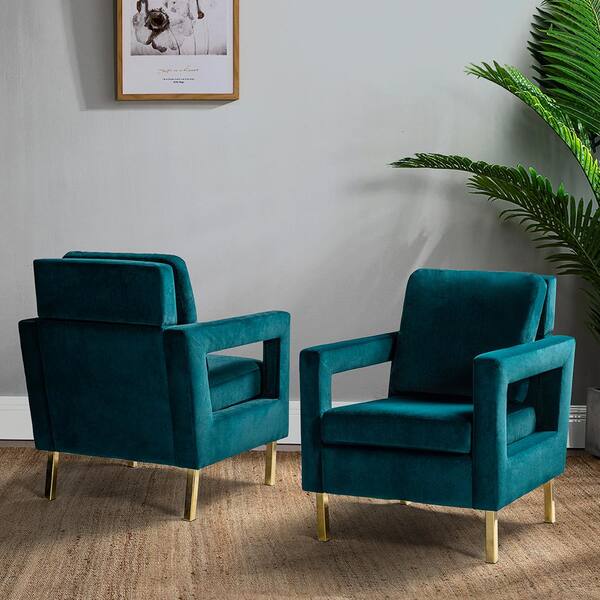 teal green armchairs