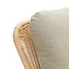 Close-up of the woven wicker back of the rocking chair.