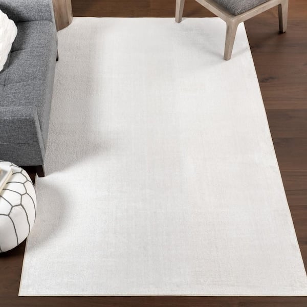 Argelia Solid Machine Washable Area Rug Beige 6 ft. 7 in. x 9 ft. Area Rug