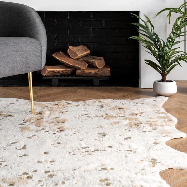 Faux Cowhide Rug DIY using Faux Cowhide Fabric for only $15