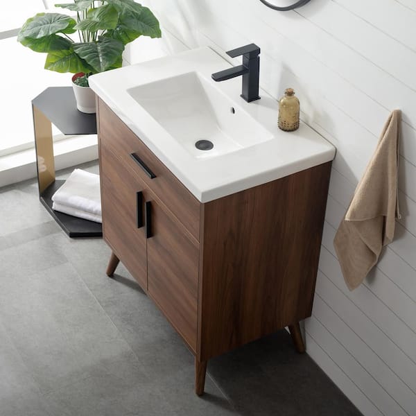 https://images.thdstatic.com/productImages/c27db9ec-80aa-4050-84b8-a48dfd9fa193/svn/sudio-bathroom-vanities-with-tops-nelson-30wn-31_600.jpg