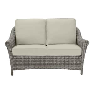 Chasewood Brown Wicker Outdoor Patio Loveseat with CushionGuard Biscuit Cushions