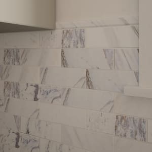 Volakas White 0.75 in. x 12 in. Honed Marble Pencil Trim Wall Tile (0.0625 sq. ft./ Each)