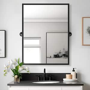24 in. W x 36 in. H Rectangular Metal Framed Pivoted Bathroom Wall Vanity Mirror in Black