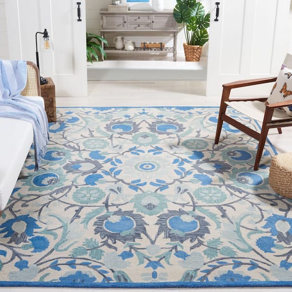 Antiquity 8 ft. x 10 ft. Ivory/Blue Floral Geometric Area Rug