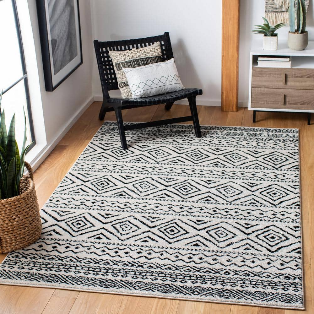 8' x 10' Black and Ivory Geometric Synthetic Area Rug