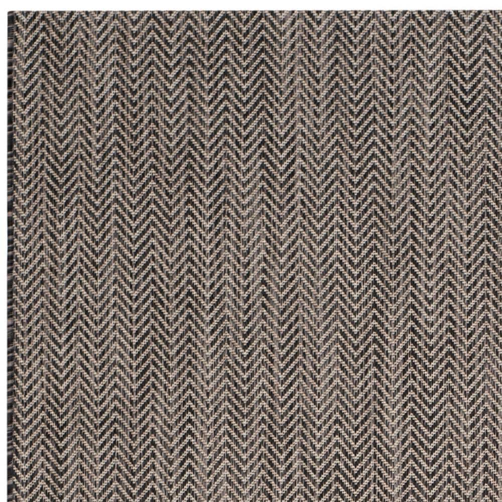 Black and Beige Flat Woven Synthetic Indoor/Outdoor Rug
