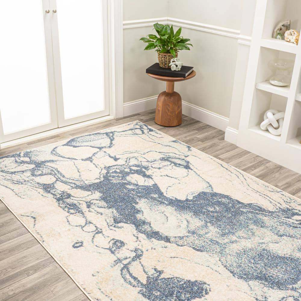 Blue and Cream Abstract 8' x 10' Synthetic Area Rug