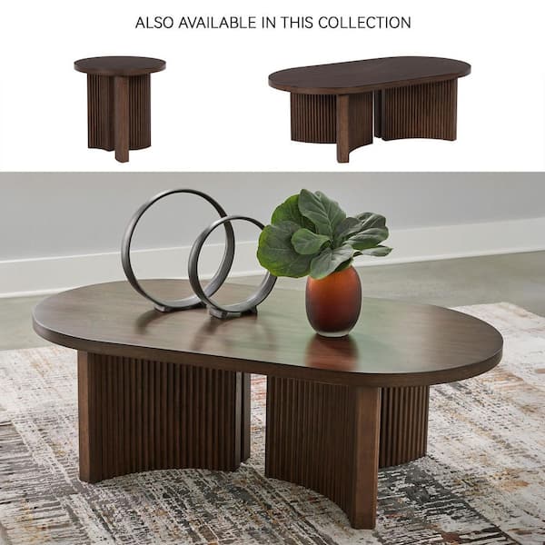 Signature DESIGN BY ASHLEY Korestone 52 in. Brown Oval Wood Coffee