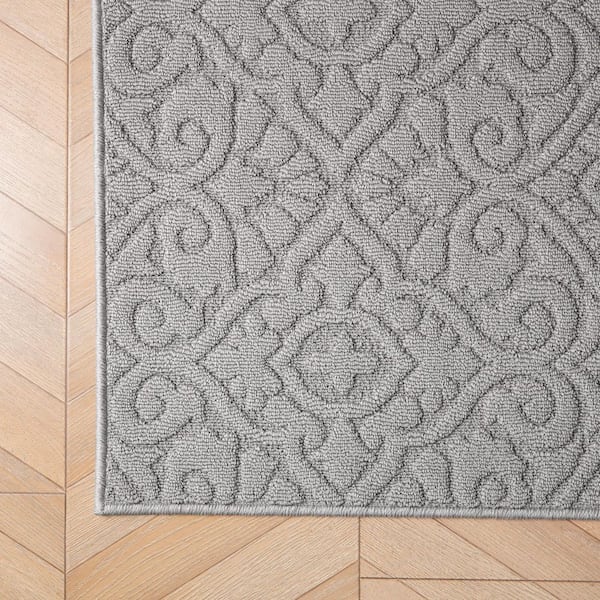 Feya Solid Light Gray 2 ft. x 6 ft. Tufted Medallion Polypropylene Runner Rug