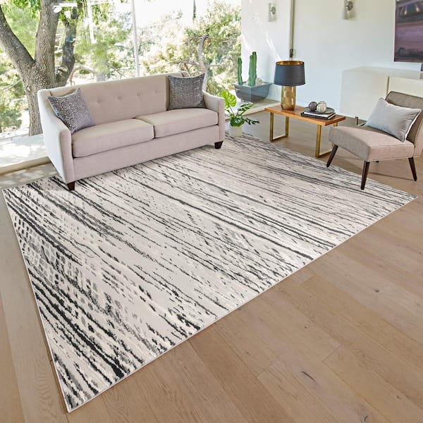 Madia Industrial Solid & Striped Distressed Grey Rug