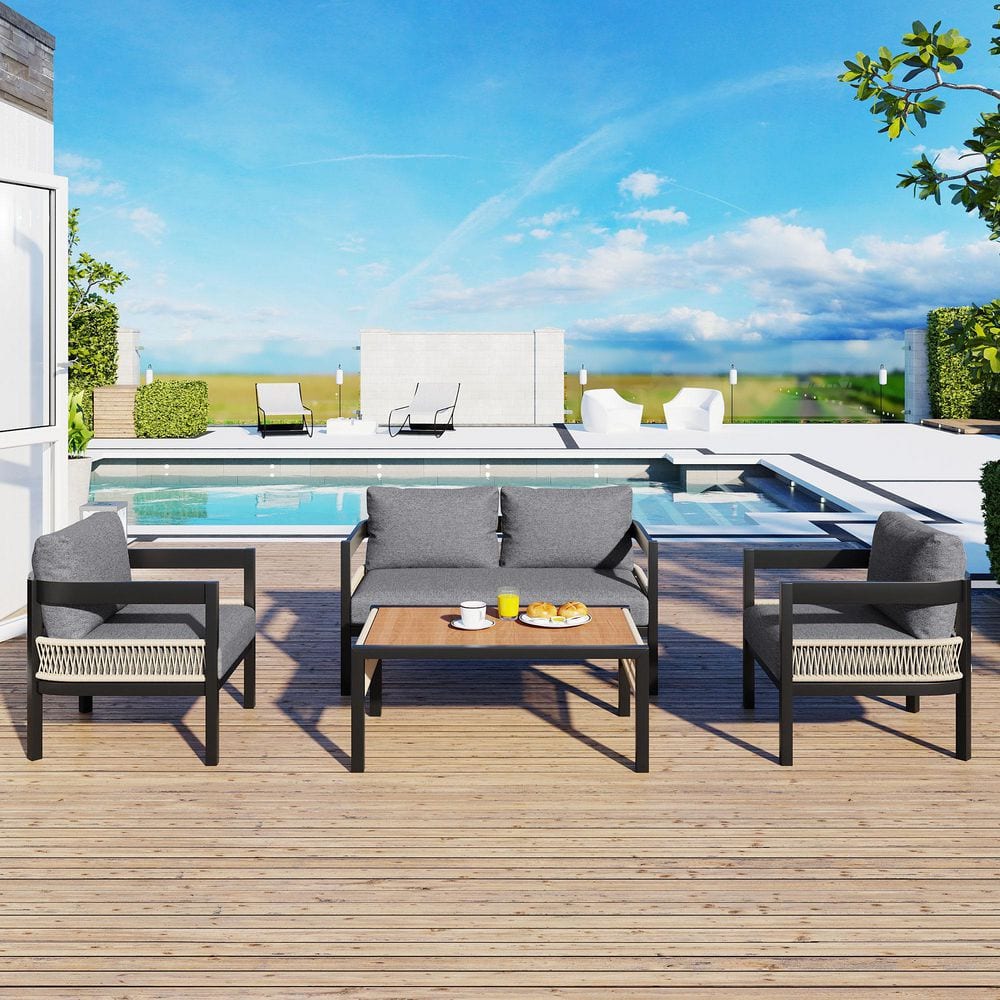 4-Piece Metal Outdoor Sectional Set with Grey Cushions and Table