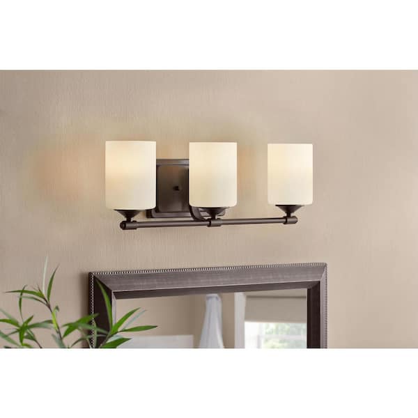 Hampton Bay Darlington 20.88 in. 3-Light Bronze Vanity Light with Frosted Opal Glass Shades