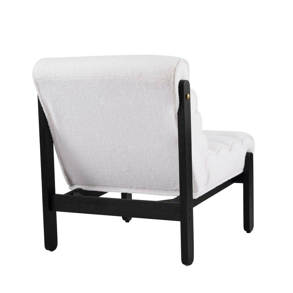Back view of a white upholstered accent chair with black frame.