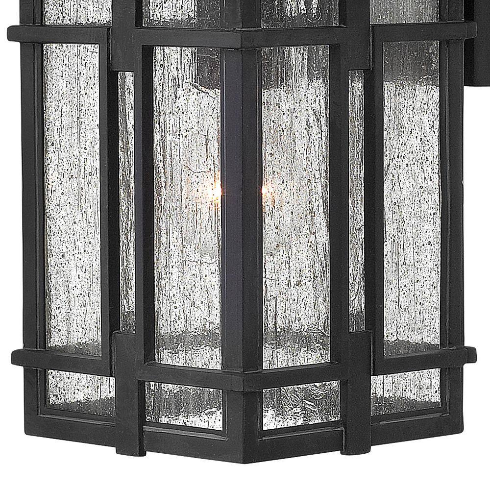 Tucker Museum Black Dimmable Outdoor Wall Sconce with Clear Seedy Glass
