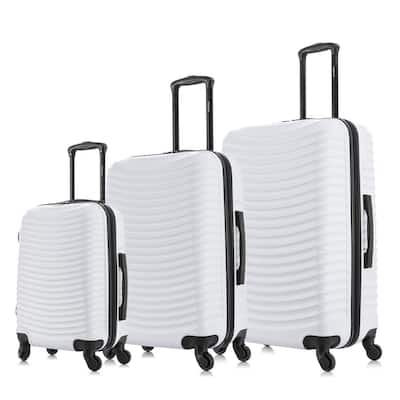 white hard luggage