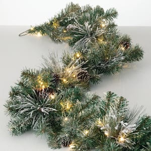 Artificial 9 ft. Flocked LED Pine Christmas Garland with Pinecones, Green