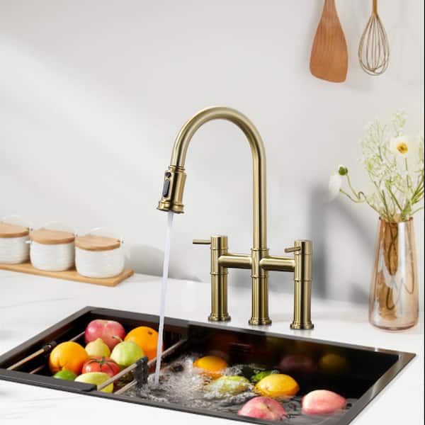 Double Handle Pull-Down Bridge Kitchen Faucet with Brass and Stainless Steel in Gold