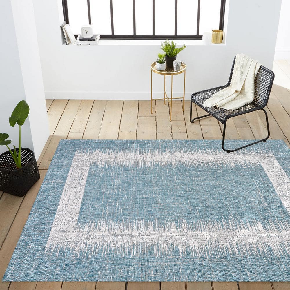Aqua and Ivory Geometric Synthetic 3' x 5' Indoor/Outdoor Area Rug