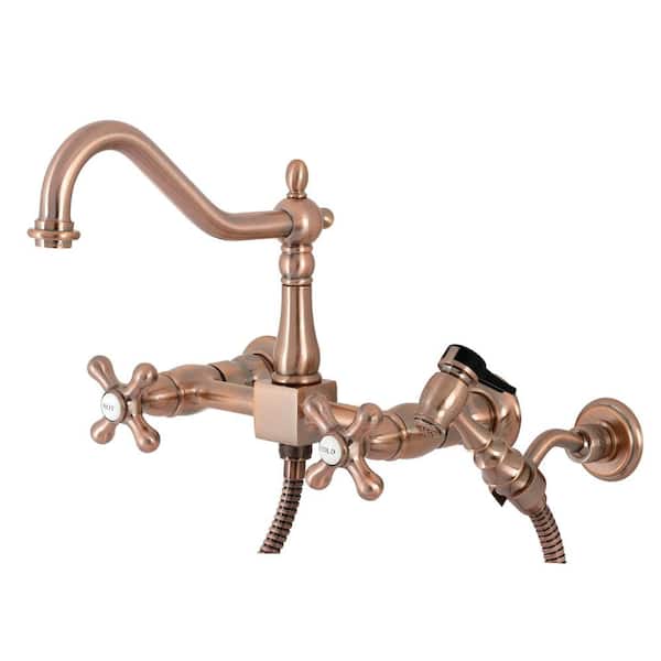 Kingston Brass Heritage 2-Handle Wall-Mount Kitchen Faucet with Side Sprayer in Antique Copper