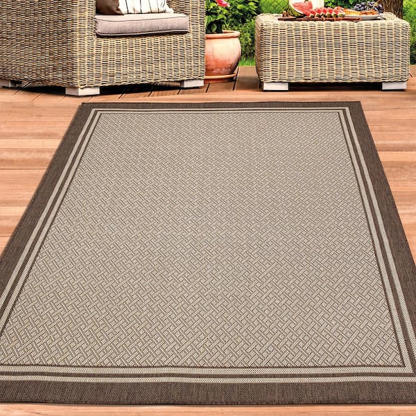 https://images.thdstatic.com/productImages/c3963ebd-3145-4743-82e7-f8cb3f978f40/svn/dark-brown-ottomanson-outdoor-rugs-jrd8759-5x7-31_600.jpg