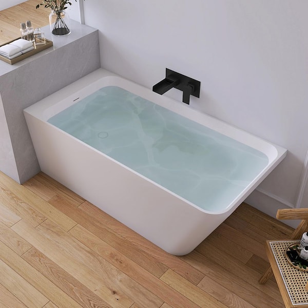 59 in. x 28 in. Stone Resin Solid Surface Freestanding Corner Soaking Bathtub in White