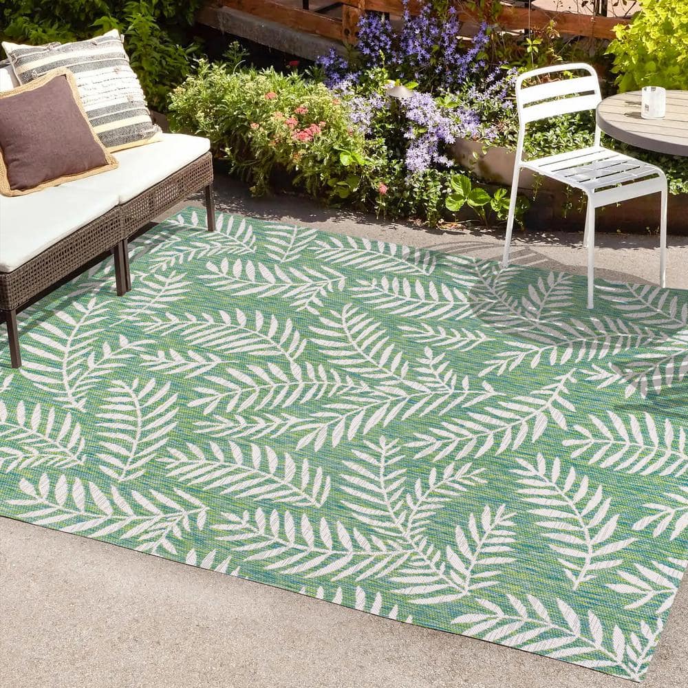 4' x 6' Green and Cream Synthetic Palm Frond Area Rug