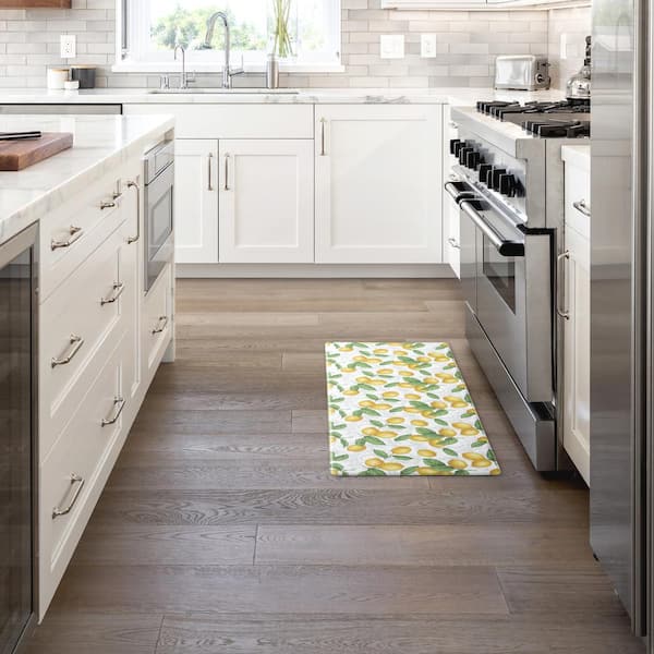 https://images.thdstatic.com/productImages/c3a15856-1da2-50cd-b0ae-efc856d6e4be/svn/white-yellow-martha-stewart-kitchen-mats-1b-lolem-718-a0_600.jpg