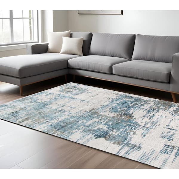 5 ft. x 8 ft. Ivory Blue And Brown Abstract Area Rug With Fringe