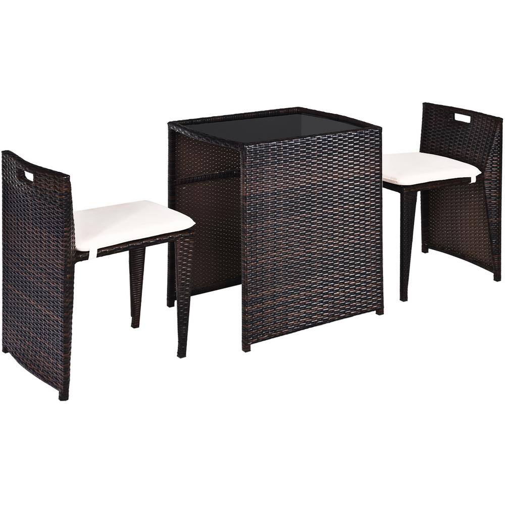 Compact Brown Wicker Outdoor Patio Set with Cushions and Glass Table