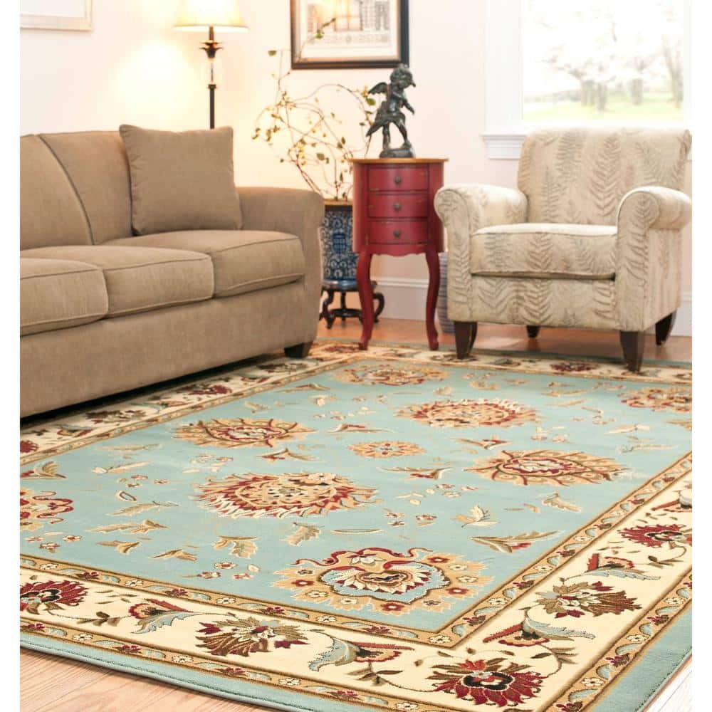 Blue and Ivory Floral Border Medium Pile Area Rug