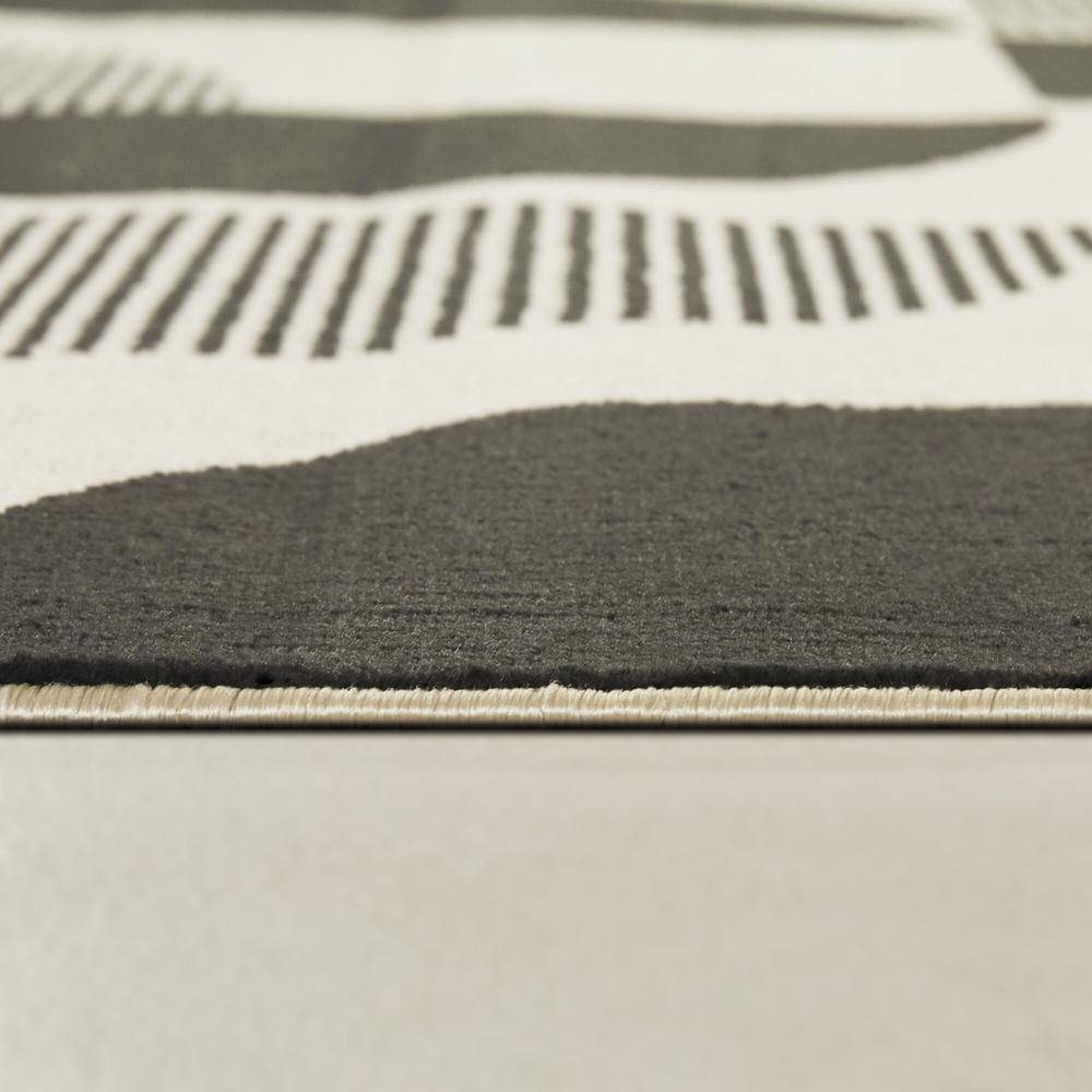 Modern Geometric Black and Beige Kids' Area Rug
