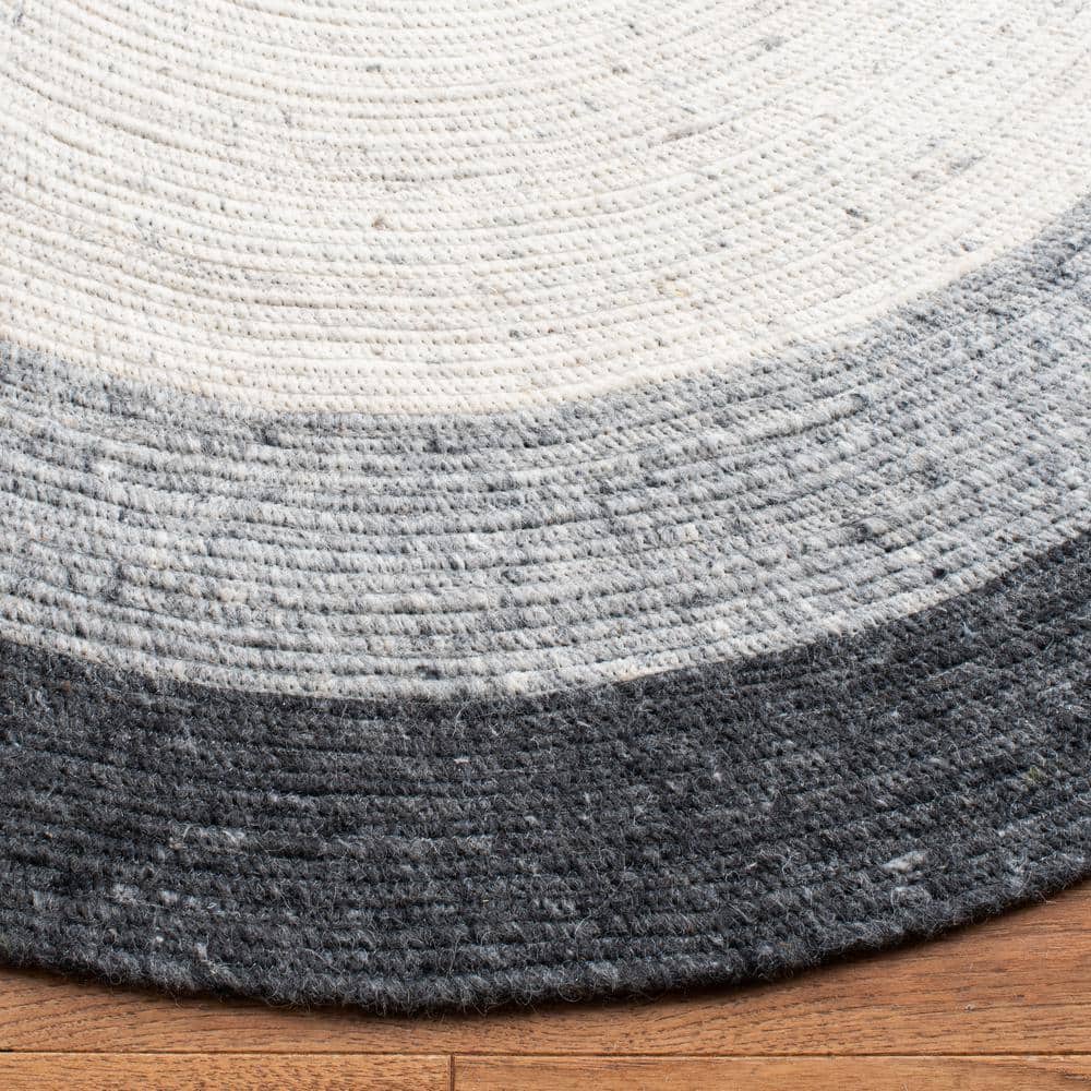 Handmade Grey/Ivory Wool Oval Braided 8' x 10' Area Rug
