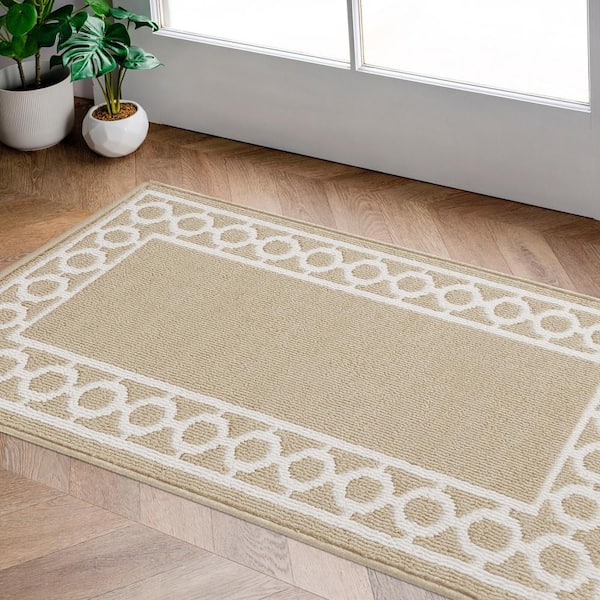https://images.thdstatic.com/productImages/c3cb385a-26b2-57a7-ae94-d445a4985857/svn/beige-and-white-jean-pierre-area-rugs-yma016660-31_600.jpg