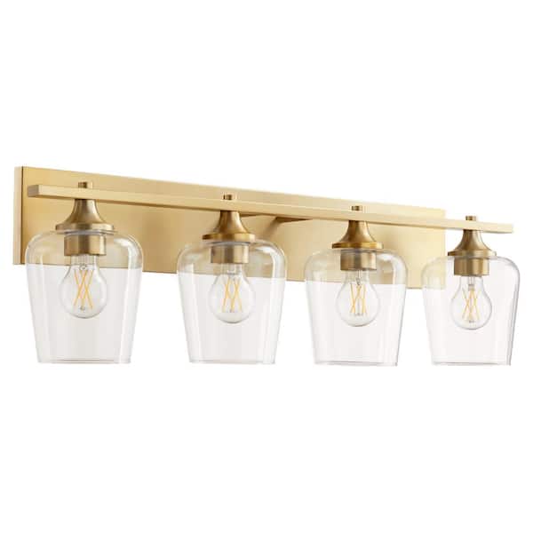 Quorum International Veno 4-Light - 100-Watt Medium Base Lamp Light Vanity 32 in. Width Vanity with 4 Clear Glass Diffusers Aged Brass