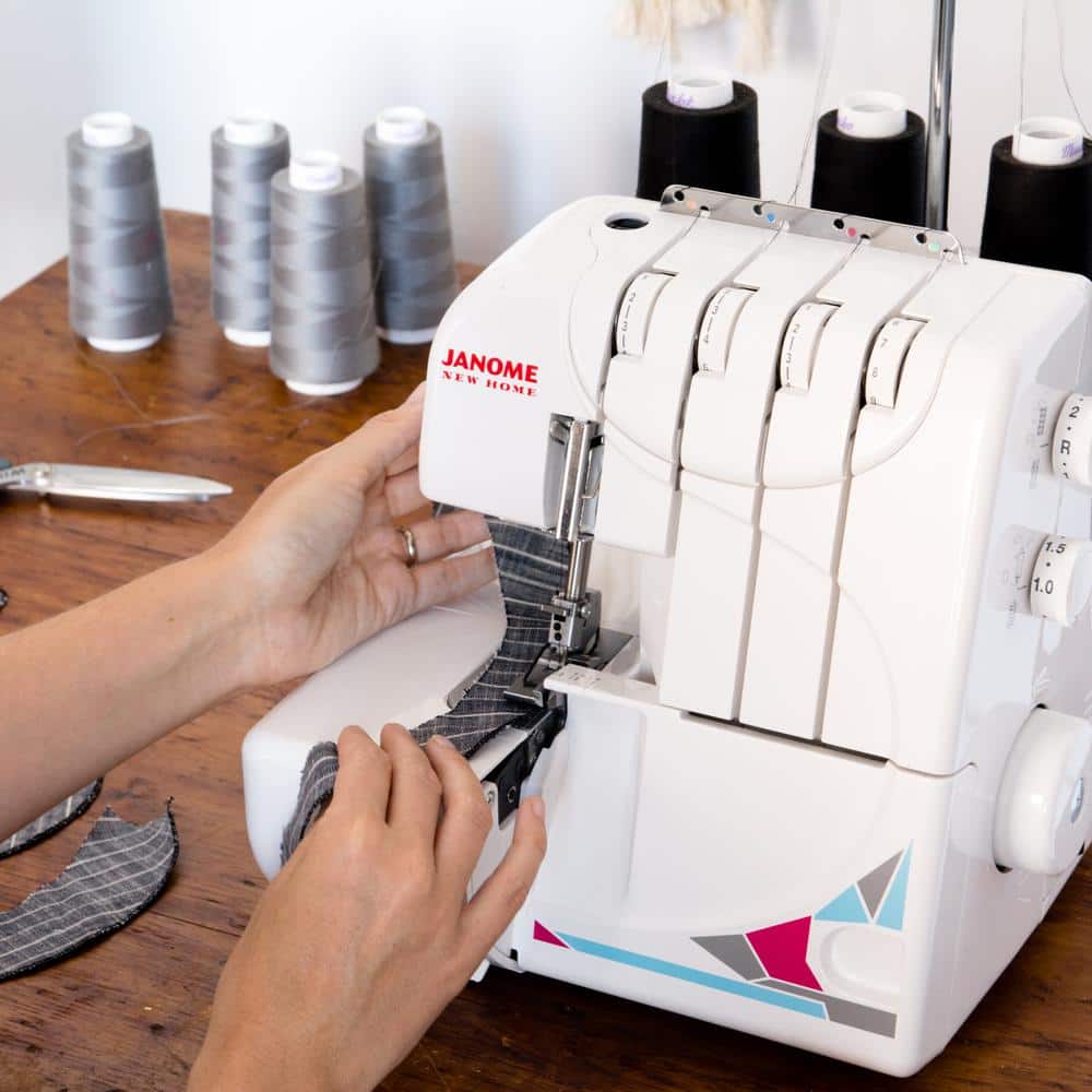 Compact White and Gray Portable Serger Machine