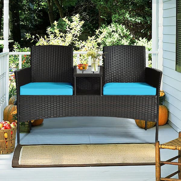 outdoor loveseat with built in table