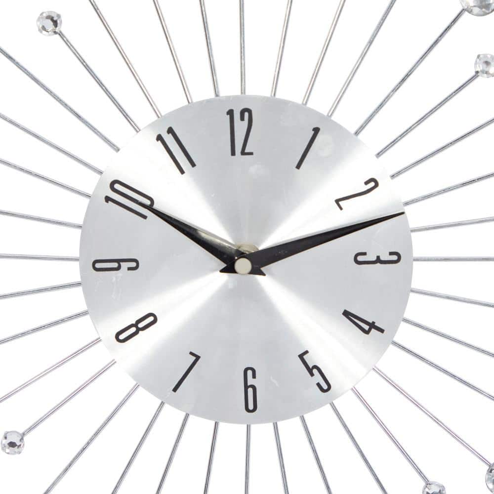 Silver Metal Starburst Wall Clock with Crystal Accents