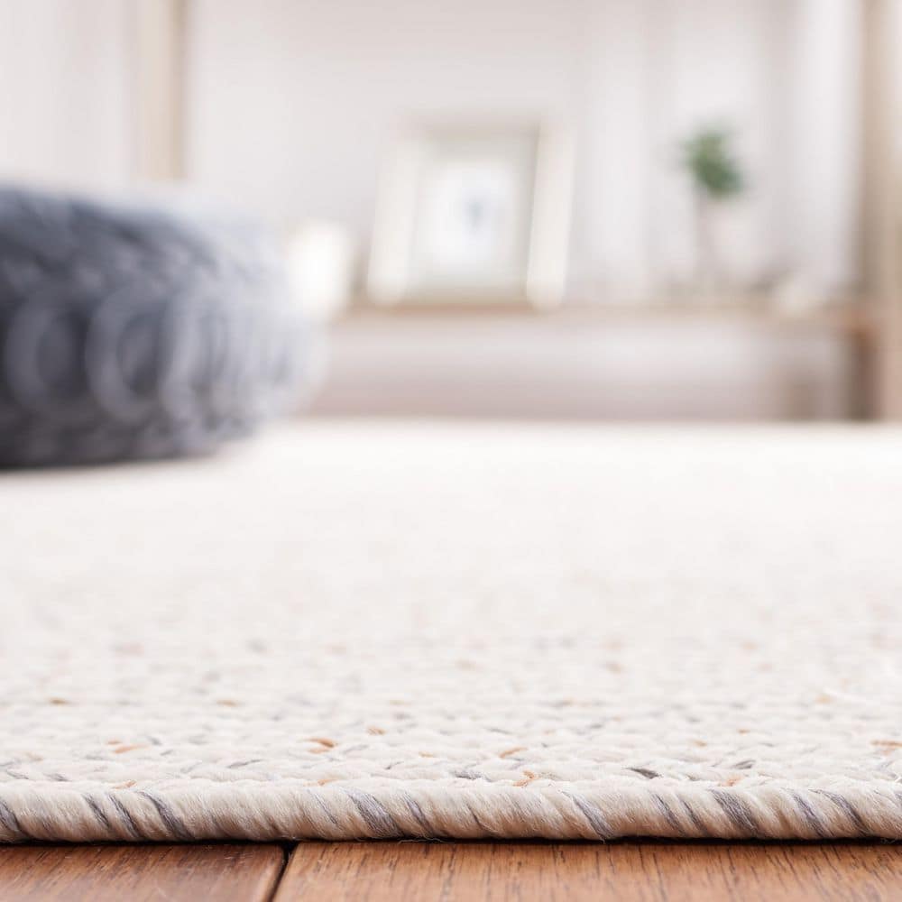 https://images.thdstatic.com/productImages/c3f14093-9135-4e0a-98fb-6ca3bc2ab5a7/svn/ivory-light-gray-safavieh-area-rugs-bra201a-8ov-4f_1000.jpg