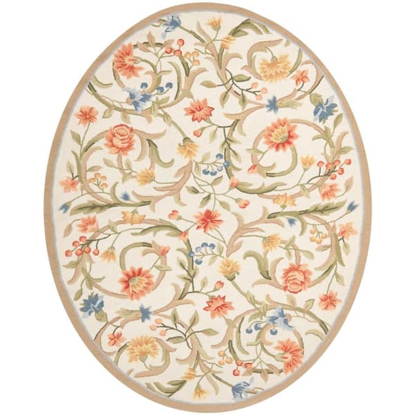 SAFAVIEH Chelsea Ivory 5 ft. x 7 ft. Oval Floral Border Solid Area Rug